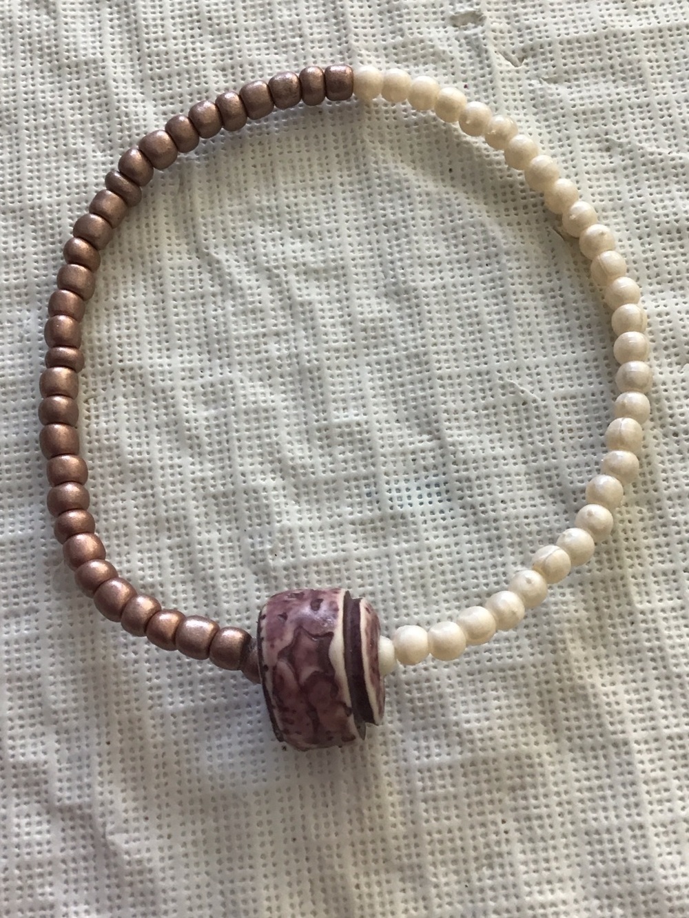 Pearl White and Rose Gold Stretch Bead Bracelet with Mauve Accent